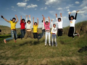 Volunteers with students